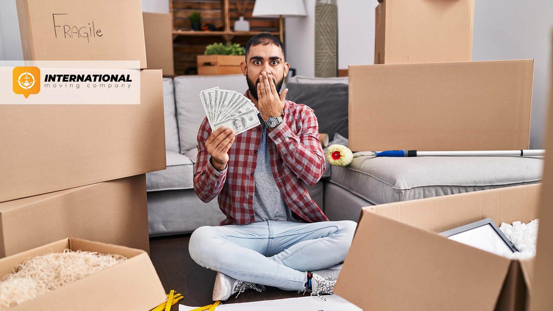 A man holding money International Moving Company Logo