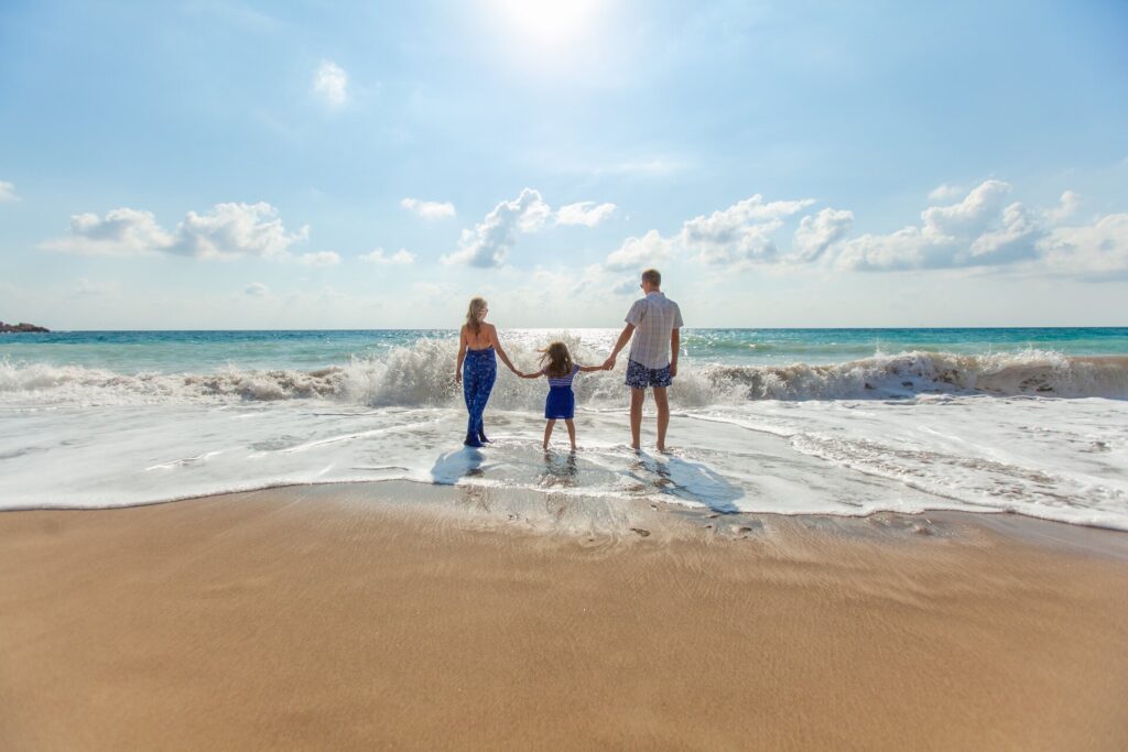 Family of three on a beach in Cyprus